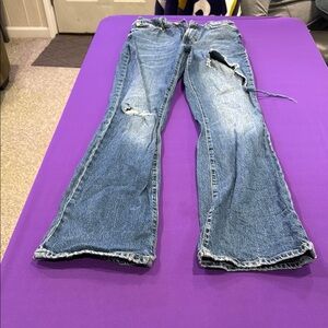 Distressed Blue Jeans